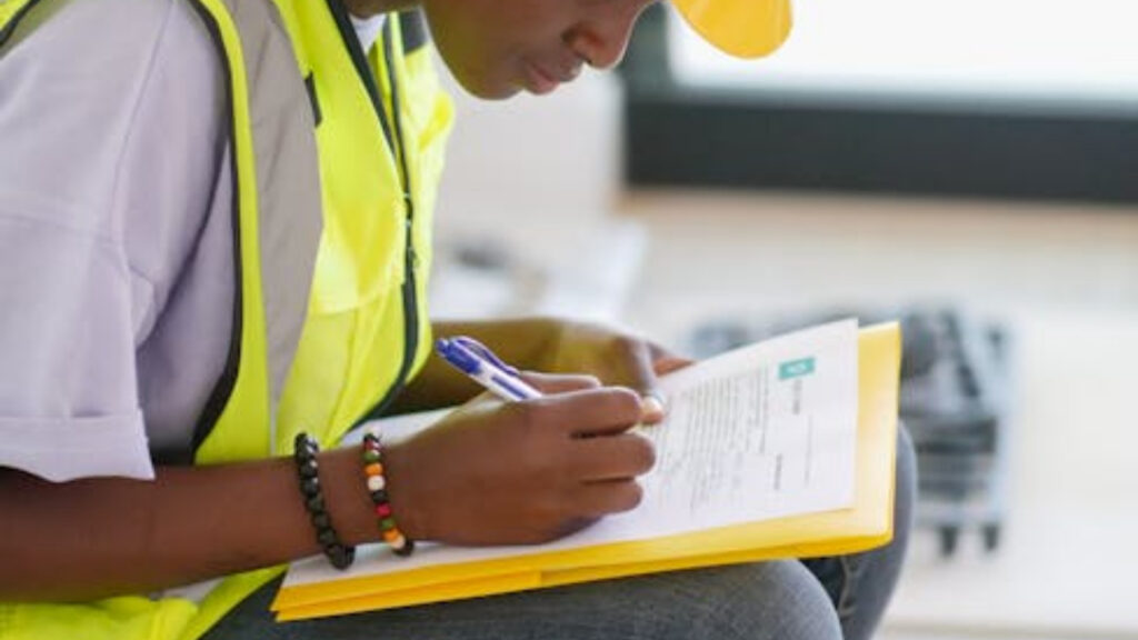 Do I Need a Fire Risk Assessment for My London Property? 2 Professional conducting fire risk assessment in London workplace – 2025 safety checklist
