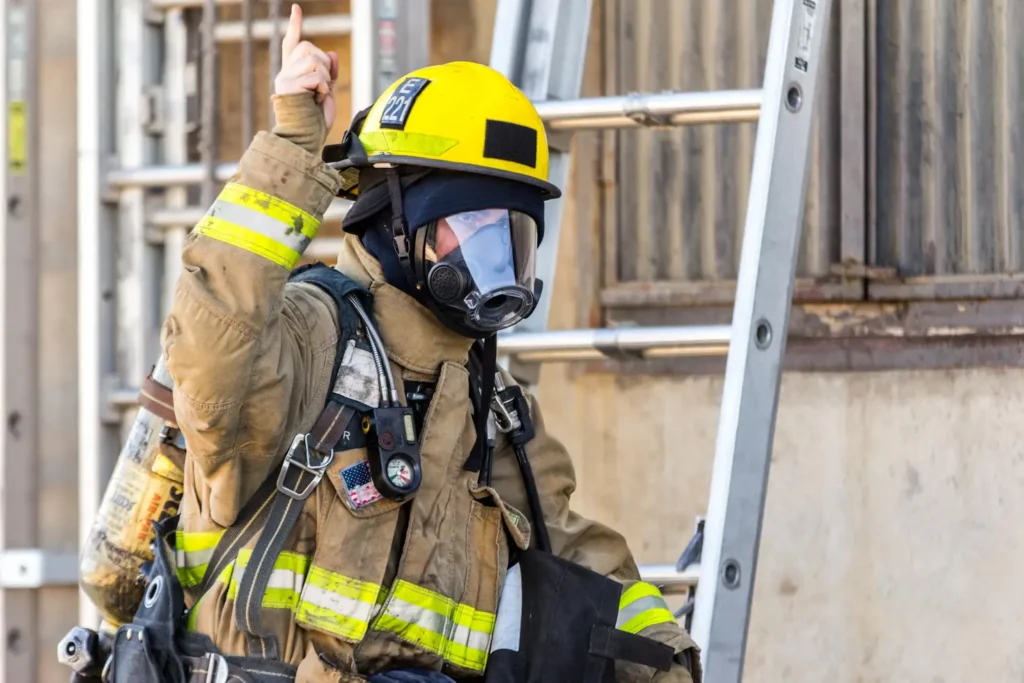 Fire Safety Inspection London – 5 Mistakes Landlords Must Avoid in 2025 1 Firefighter in full gear during a fire safety inspection London