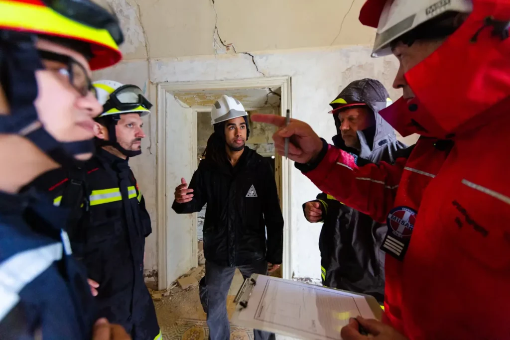 Fire Safety Inspection London – 5 Mistakes Landlords Must Avoid in 2025 2 Fire safety inspection London team assessing structural damage inside a building