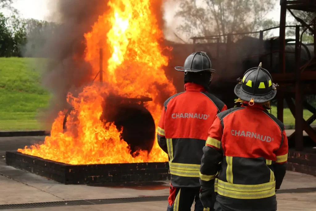 How Often Should Landlords in London Conduct Fire Risk Assessments? 2 Certified inspector conducting a commercial fire risk assessment London inside a business premises.